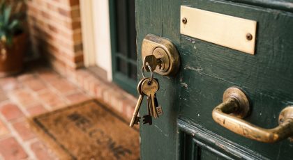 House keys hanging in the front door lock of an Australian home