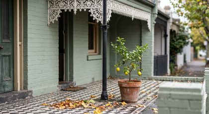 Cast-iron lace verandah on a Victorian terrace in Melbourne, the kind of home sold with a Section 32 vendor statement